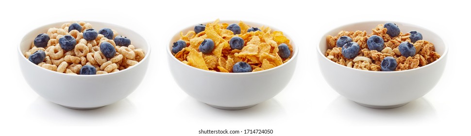 Set of different breakfast cereals with fresh blueberries isolated on white background - Powered by Shutterstock