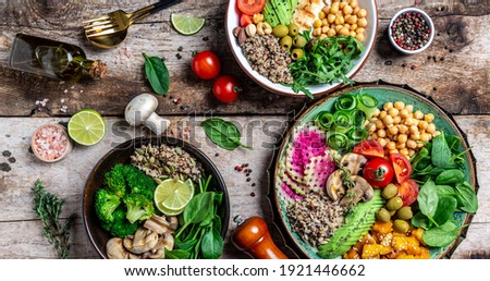 Set of different buddha bowls. Clean and balanced healthy food concept. Chicken grilled meat, green vegetables, chickpeas and quinoa, Halthy eating, dieting food concept. top view.
