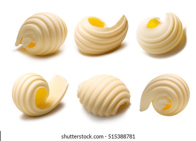 Set of different butter curls or rolls. Clipping paths, shadows separated