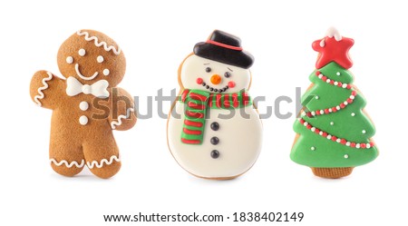 Set of different Christmas cookies on white background