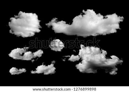 Set of different clouds isolated on black background. Design elements