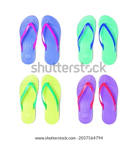 Set with different colorful flip flops on white background, top view
