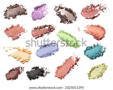Set of different crushed eye shadows on white background, top view. Bright palette