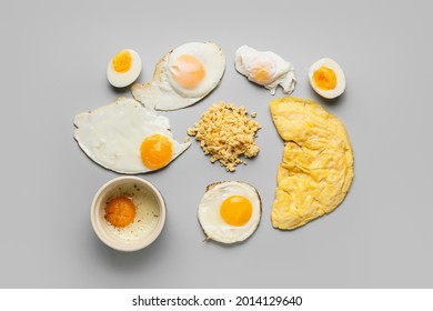 Set of different egg dishes on light background