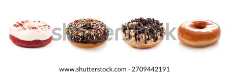 Set of different flavors of donuts isolated on white background. Red velvet, chocolate, cookies and cream, glazed donut. Many flavors of donuts, set isolated. Delicious donut set.