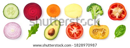 Set of different fresh vegetable slices isolated on white background, top view. Tomato, potato, cucumber, bell pepper, onion, caroot, pumpkin, broccoli, avocado, spinach and arugula