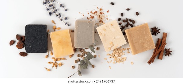 Set of different handcraft organic soap bars with natural ingredient, top view. Healthy lifestyle and wellness concept. 