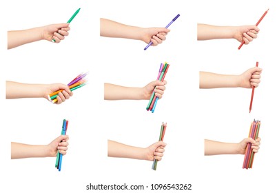 Set Of Different Kid Hand Hold Color Felt Pens And Pencils With Hand, Isolated On White Background.