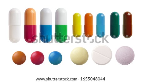 A set of different pills isolated on white background.