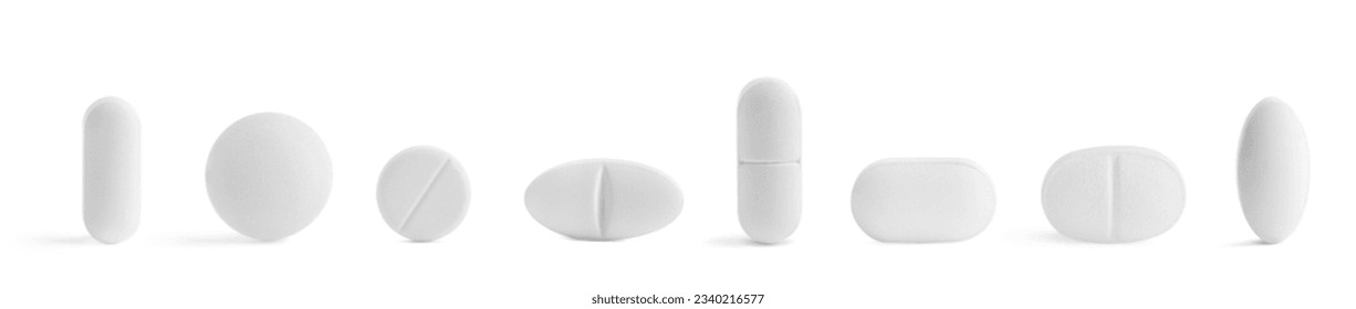 Set of different pills in row isolated on white