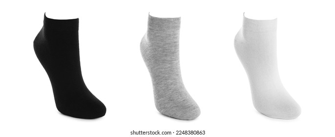 Set with different socks on white background. Banner design