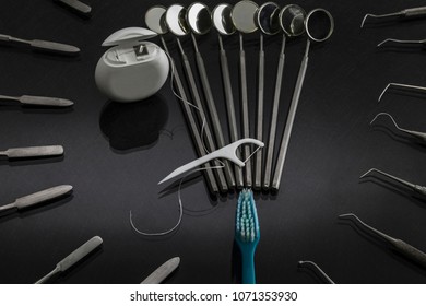 Set of different tools for dental care on background - Shutterstock ID 1071353930