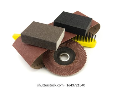 Set Of Different Tools For Grinding - Sanding Belt, Metal Wire Bristle Brush, Abrasive Sponge And Flap Disc For Angle Grinder, Isolated On White Background