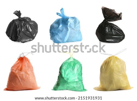 Set with different trash bags full of garbage on white background