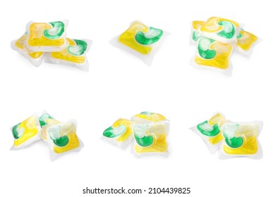 Set with dishwasher detergent gel capsules on white background