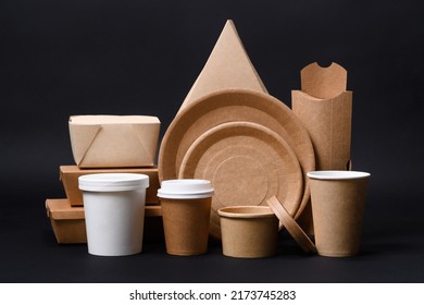 A Set Of Disposable Eco-friendly Paper Utensils On A Dark Background. The Concept Of Using Biodegradable Materials