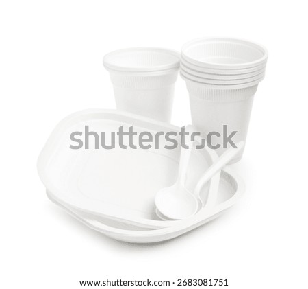 Set of disposable plastic tableware isolated on white