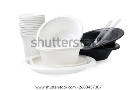 Set of disposable plastic tableware isolated on white