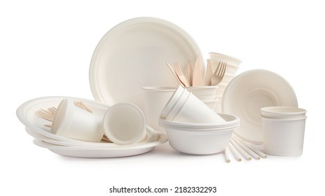 Set of disposable tableware on white background