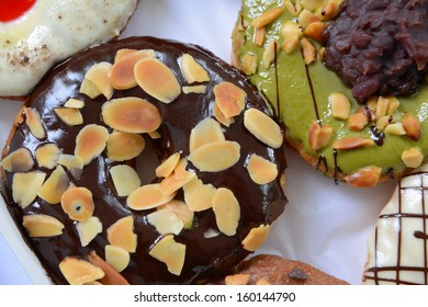 set of donuts in box close up 