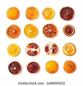 Set Of Dried Slices Of Orange And Blood Orange Isolated On White Background. Dry Lemon, Tangerine And Red Sicilian Orange Top View