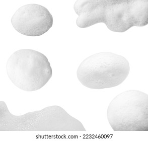 Set with drops of fluffy soap foam on white background, top view - Shutterstock ID 2232460097