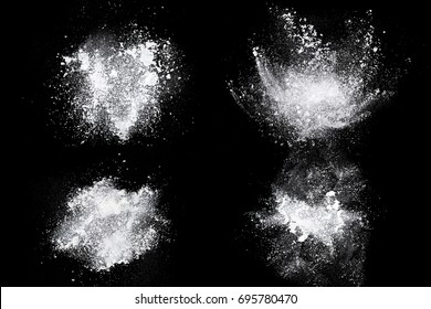Set of dust powder splash clouds isolated on black background - Shutterstock ID 695780470
