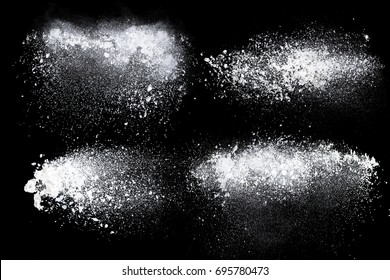 Set of dust powder splash clouds isolated on black background - Shutterstock ID 695780473