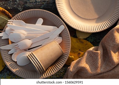 Set Of Eco, Biodegradable Paper Coffee Cups, Wooden Spoon Fork Napa. Zero Waste, Environmentally Friendly, No Plastic Concept. Top View, Copy Space.