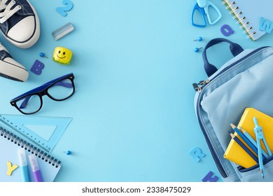 Set for elementary school concept. Top view photo of stylish shoes, child's bag, glasses, school stationery, blue letters on pastel blue background with empty space for promo or text