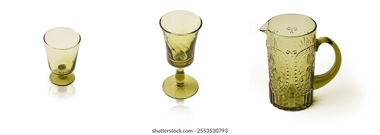 A Set of Empty transparent olive green crystal glass and jar, Vintage glass, cordial glass, tableware, glassware, glass of water on a white background. isolated objec