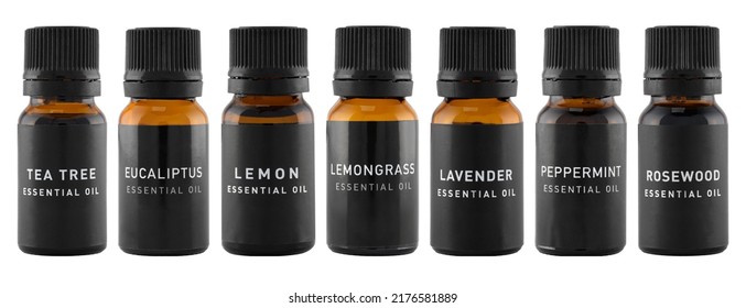 Set Of Essential Oil Bottles Isolated On A White. Lavender, Lemongrass, Lemon, Peppermint, Rosewood, Tea Tree And Eucalyptus Oils. Natural Cosmetic, Aromatherapy, Wellbeing, Skincare. Clipping Path.