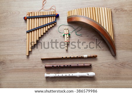 set of ethnic wooden flutes closeup
