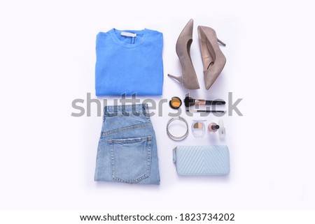 Set of female clothes and accessories ,make up on white background . Flat lay,