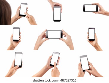 Set Of Female Hands Holding Black Modern Cellphone With Blank Screen At Isolated White Background.