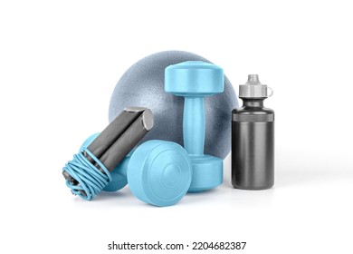 Set of fitness equipment. Dumbbells, sport bottle of water, jump rope, gymnastic ball on a white background isolated, front view, close-up. Home workout. Fitness and activity. - Shutterstock ID 2204682387