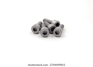 set of five silver colored socket head cap screws or Allen bolts commonly used in motorcycle assembly and customization.
