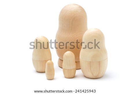Set of five wooden unpainted matryoshkas isolated