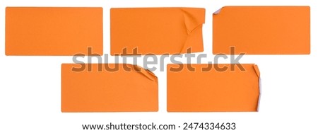 A set of fluorescent neon orange rectangular paper sticker label isolated on white background.