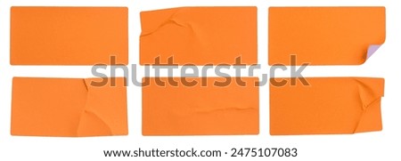 A set of fluorescent neon orange rectangular paper sticker label isolated on white background.