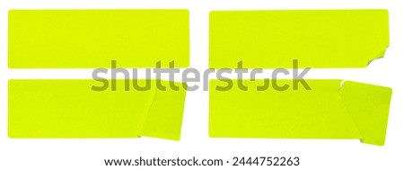 A set of fluorescent neon yellow rectangular paper sticker label isolated on white background.
