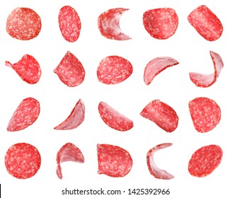 Set of flying cut fresh sausage on white background
