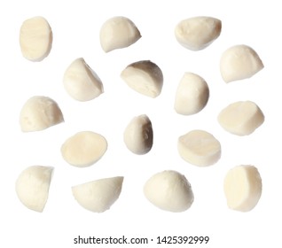 Set of flying delicious mozzarella cheese on white background