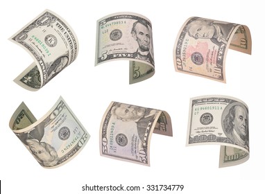 Set Of Flying Dollar Bills. Isolated On White