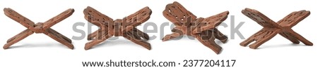 set of foldable wooden quran stand or holder, aka rehal, handmade and carved x shaped lectern or book rest used to hold religious scriptures isolated on white background in different angles