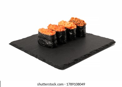 Set Of Four Gunkan Sushi Rolls On Black Ceramic Table Setting Plate. Tasty Orient Japanese Cuisine Dish With Salmon, Tuna, Eel And Tobiko In Spicy Sauce. Isolated Food On White Background Front View.