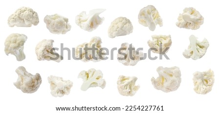 Set of fresh cauliflower florets on white background