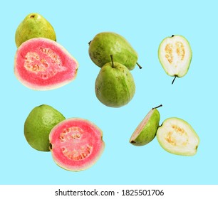 A set of fresh pink/red gauva fruit isolated and white gauva with clipping path in pastel baby blue background, no shadow, tropical fruit, slices and pieces