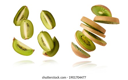 A set with Fresh raw kiwi with leaves falling in the air isolated on white background. Food levitation concept. High resolution image