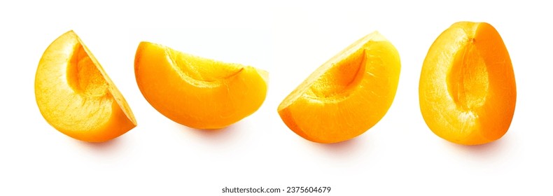 Set of fresh sliced apricots. Apricot slices isolated on white background.